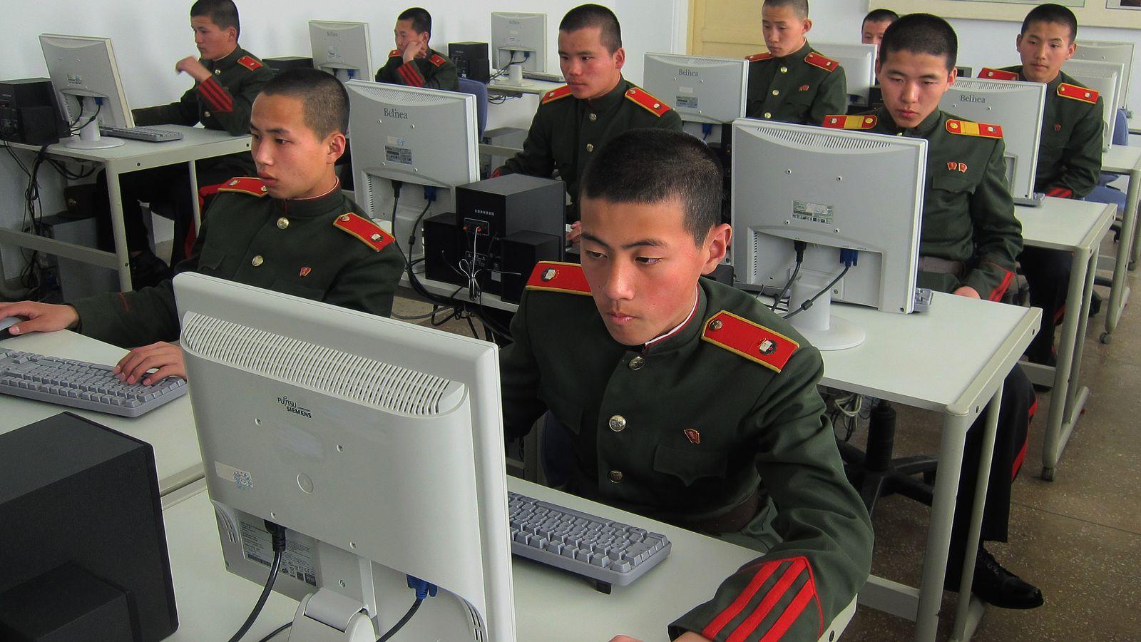 Rows of students at Mangyongdae Revolutionary School, a prestigious academy in Pyongyang, sit at computers.