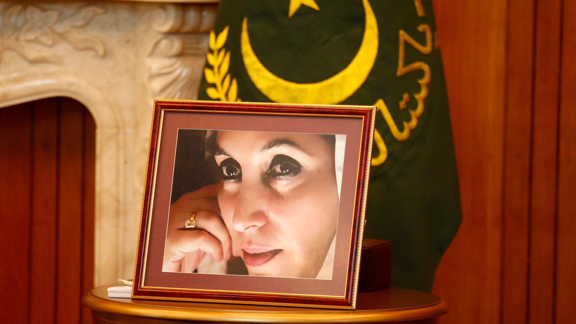 A portrait of assassinated Pakistani Prime Minister Benazir Bhutto is displayed atop a table in Islamabad.