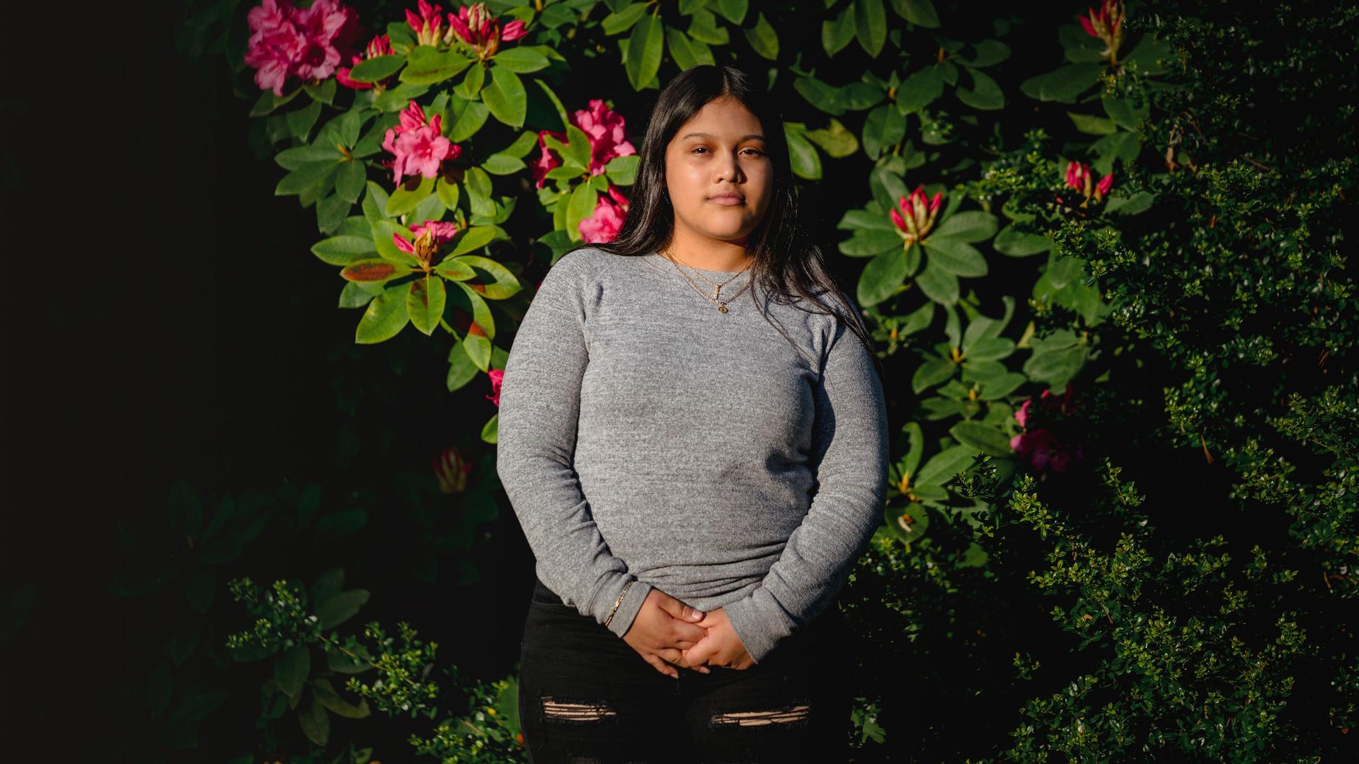 Michelle Aguilar Ramirez stands for a portrait in South Seattle, Washington, May 18, 2020.