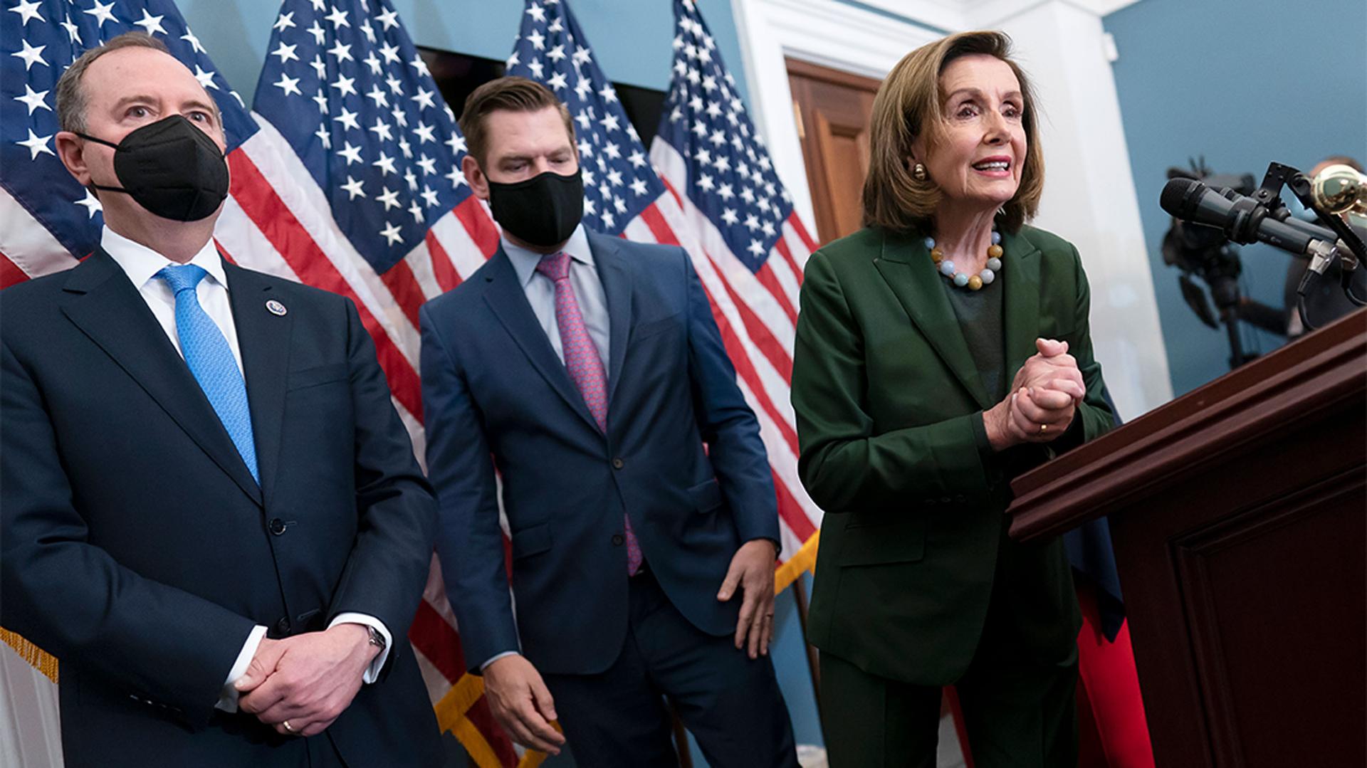 Speaker of the House Nancy Pelosi, joined by House Intelligence Committee Chairman Adam Schiff and Rep. Eric Swalwell, holds a news conference at the Capitol in Washington