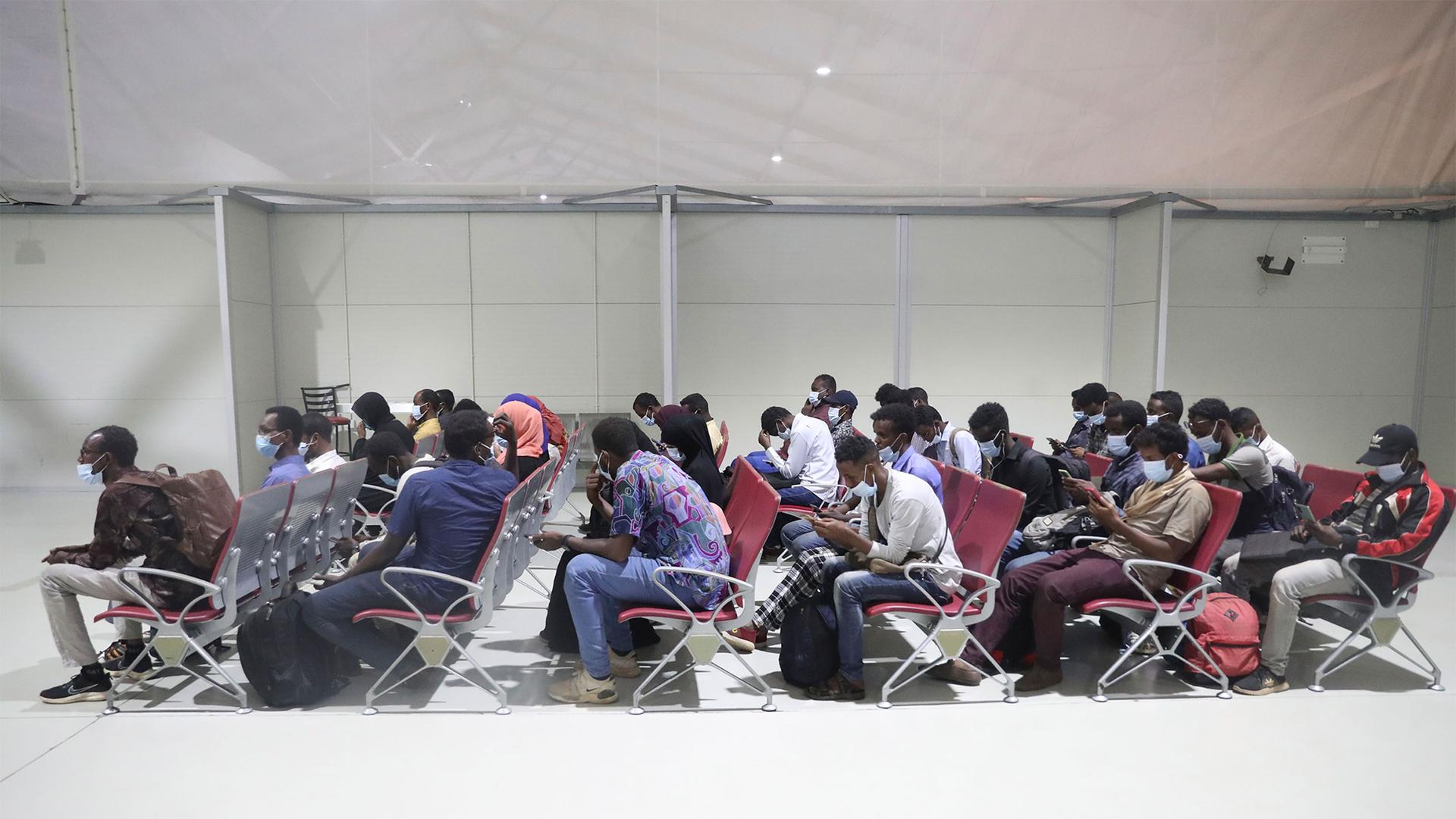The first group of Kenyan evacuees from Sudan arrive at Jomo Kenyatta International Airport in Nairobi, Kenya, April 24, 2023.