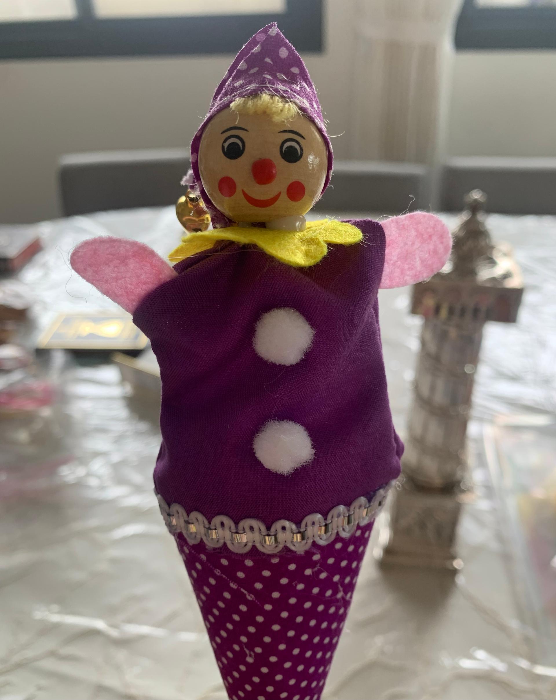 A festive Purim noisemaker used during the reading of the Book of Esther on Purim.