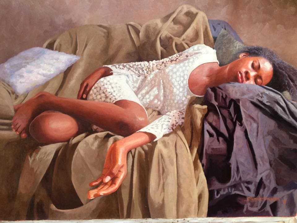 Girl sleeping on a couch.