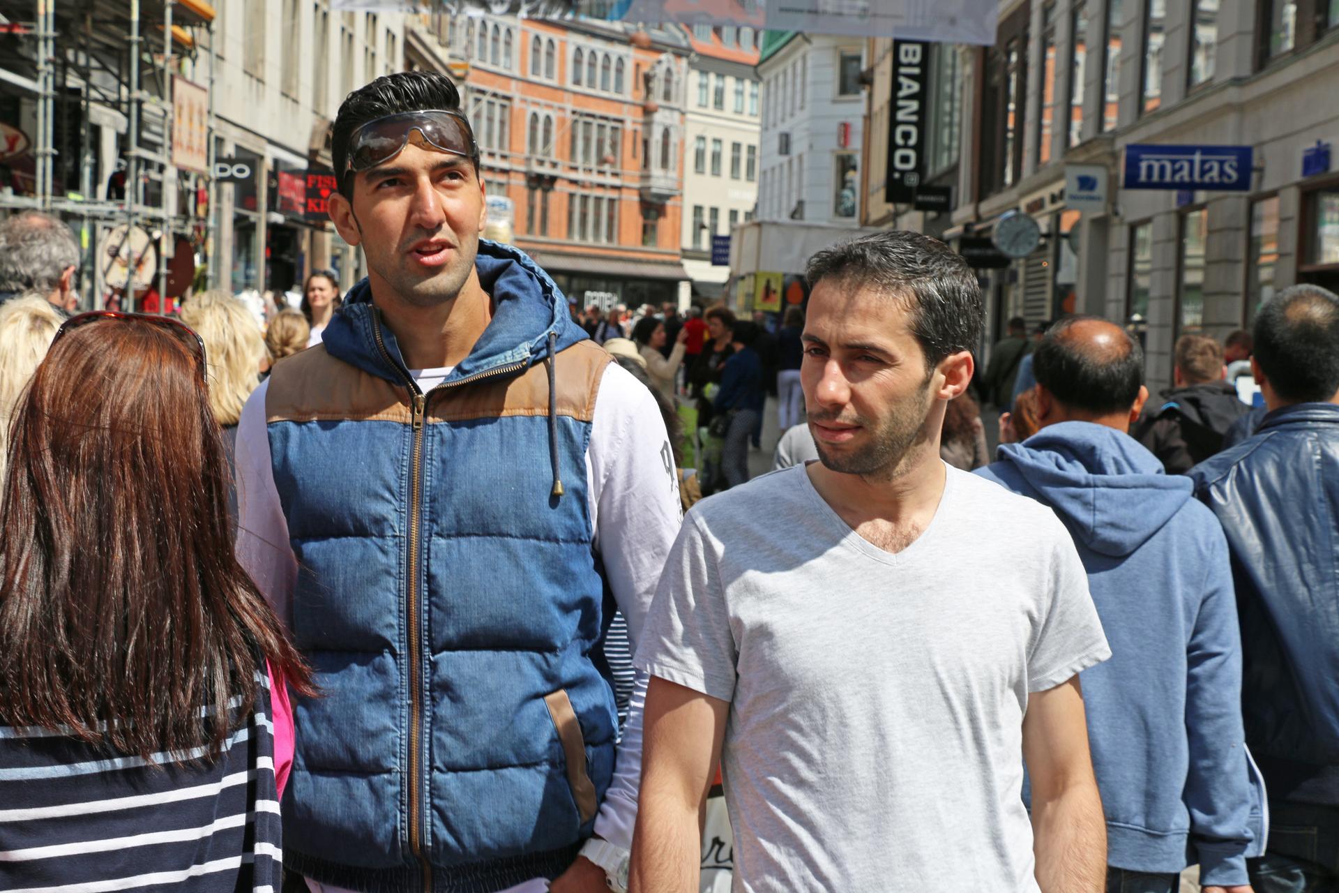 Abdullah Touma and his Syrian housemate walk around Copenhagen’s city center on a weekend day off from work.