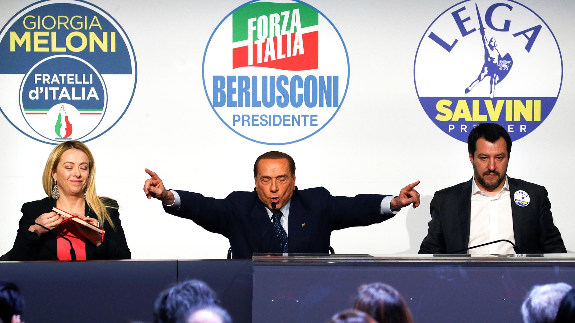 Forza Italia leader Silvio Berlusconi speaks flanked by Fratelli D'Italia party leader Giorgia Meloni and Northern League leader Matteo Salvini during a meeting in Rome.