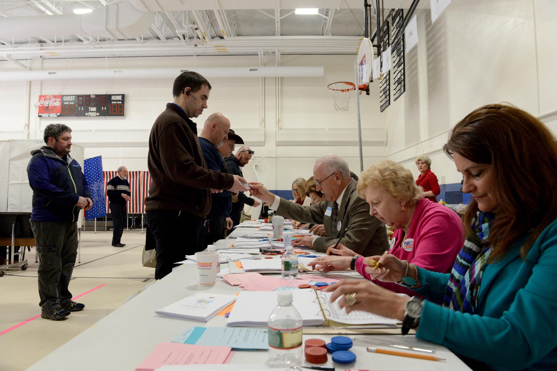 Voters line up in New Hampshire, February 9, 2016.