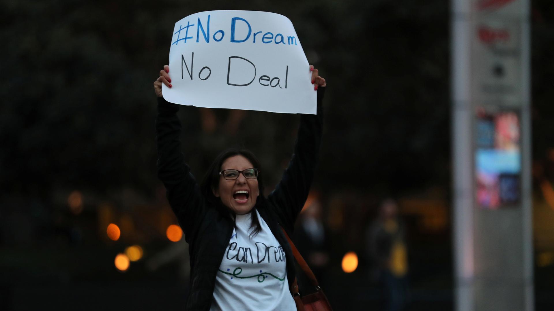 A group of demonstrators block traffic to demand action by the federal government on the Deferred Action for Childhood Arrivals (DACA) in downtown San Diego.