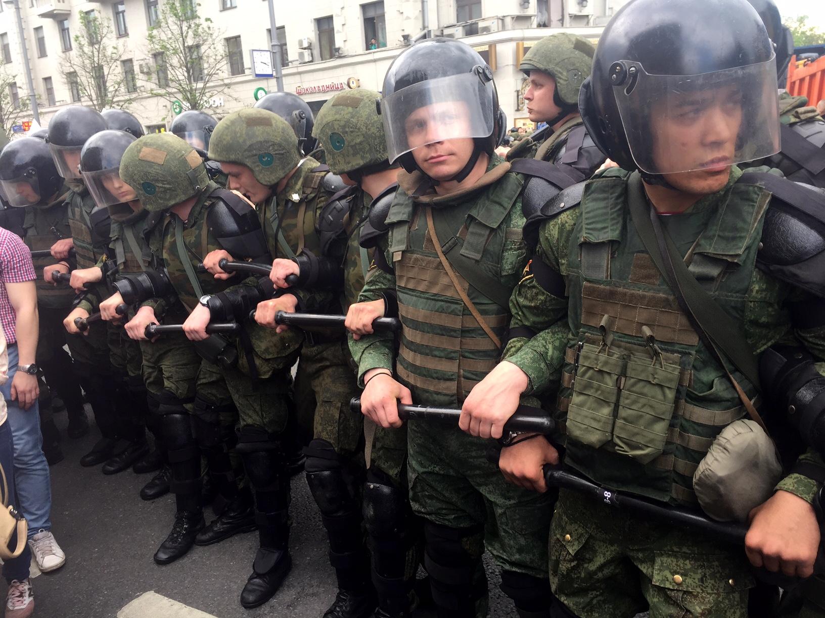 Police officers in riot gear in Moscow.