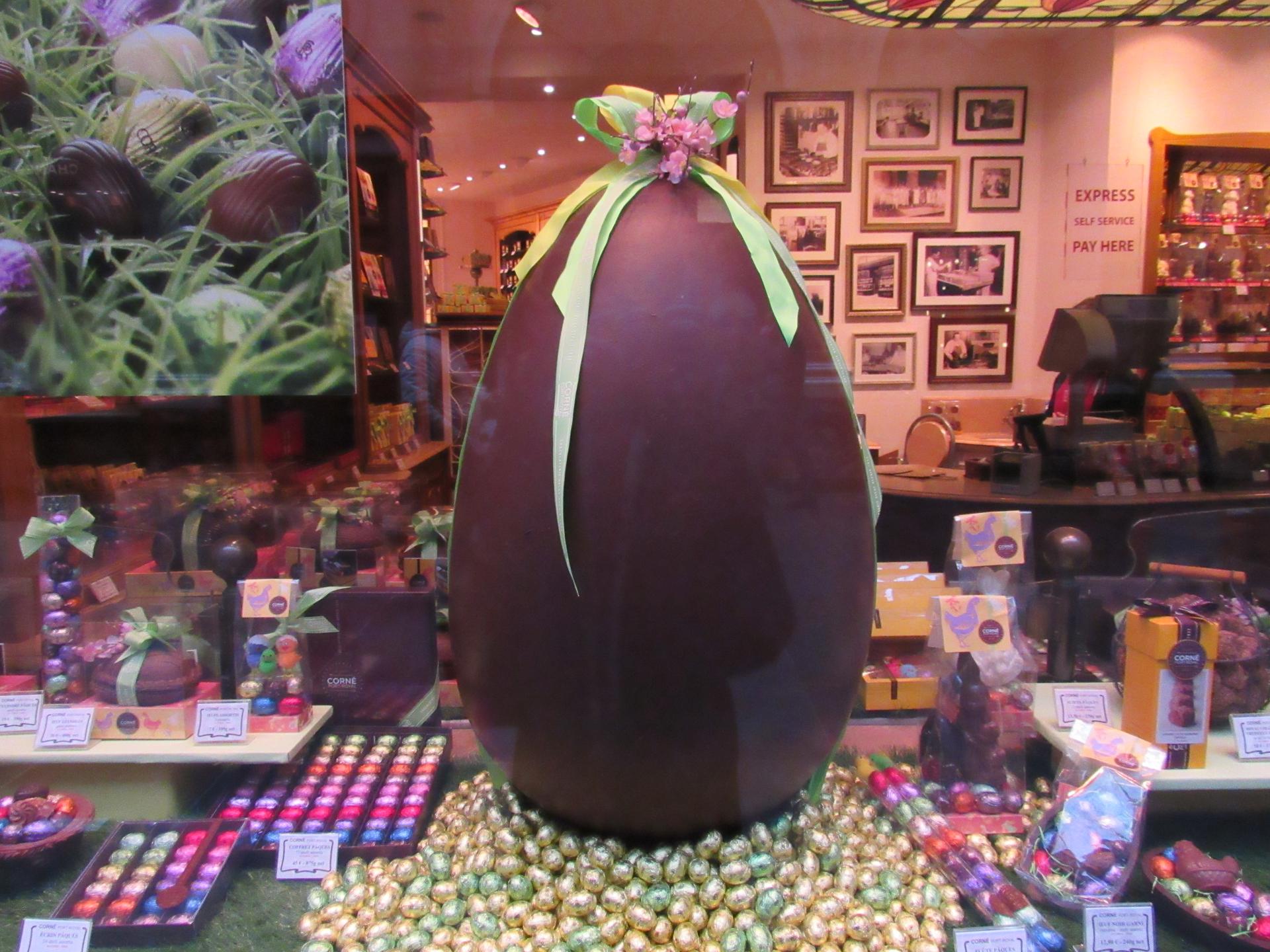 A giant chocolate egg displayed in a confectioner's storefront in Brussels, Belgium.