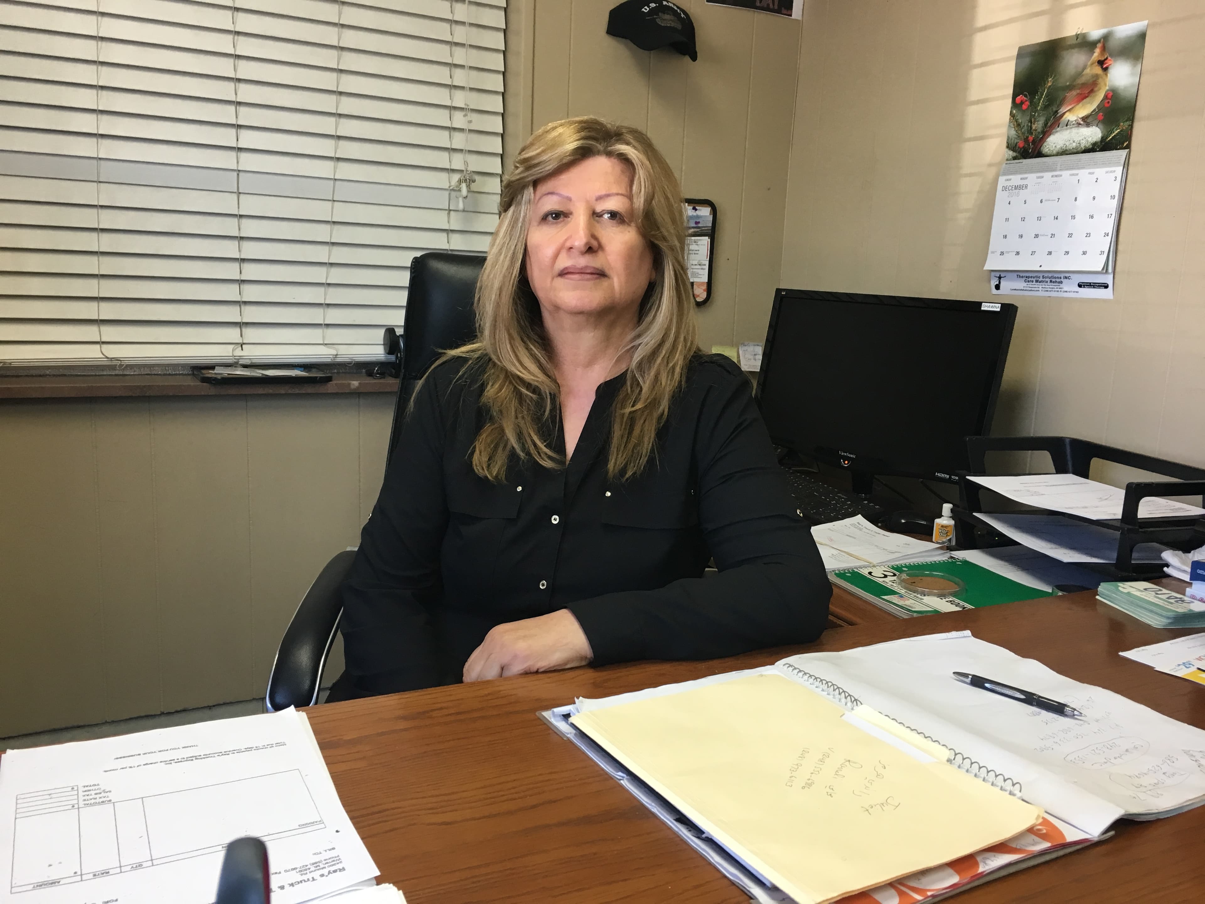 Since he was deported, Juliette Kassyonan, Raied Jabou's mother, has been helping run his business. She worries about Jabou's safety and believes his deportation was unjust.