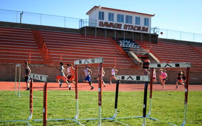 Students workout during track practice at Savage Stadium in Lamar. A bill going through the Colorado Legislature that would require panel approval for mascot and team names.