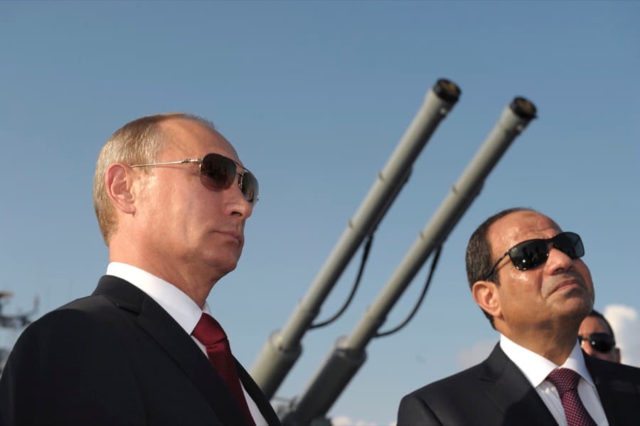 Egyptian President Abdul Fattah al-Sisi, right, with Russia's Vladimir Putin attend a ceremony onboard a guided missile cruiser at the Black Sea port of Sochi, in August 2014.