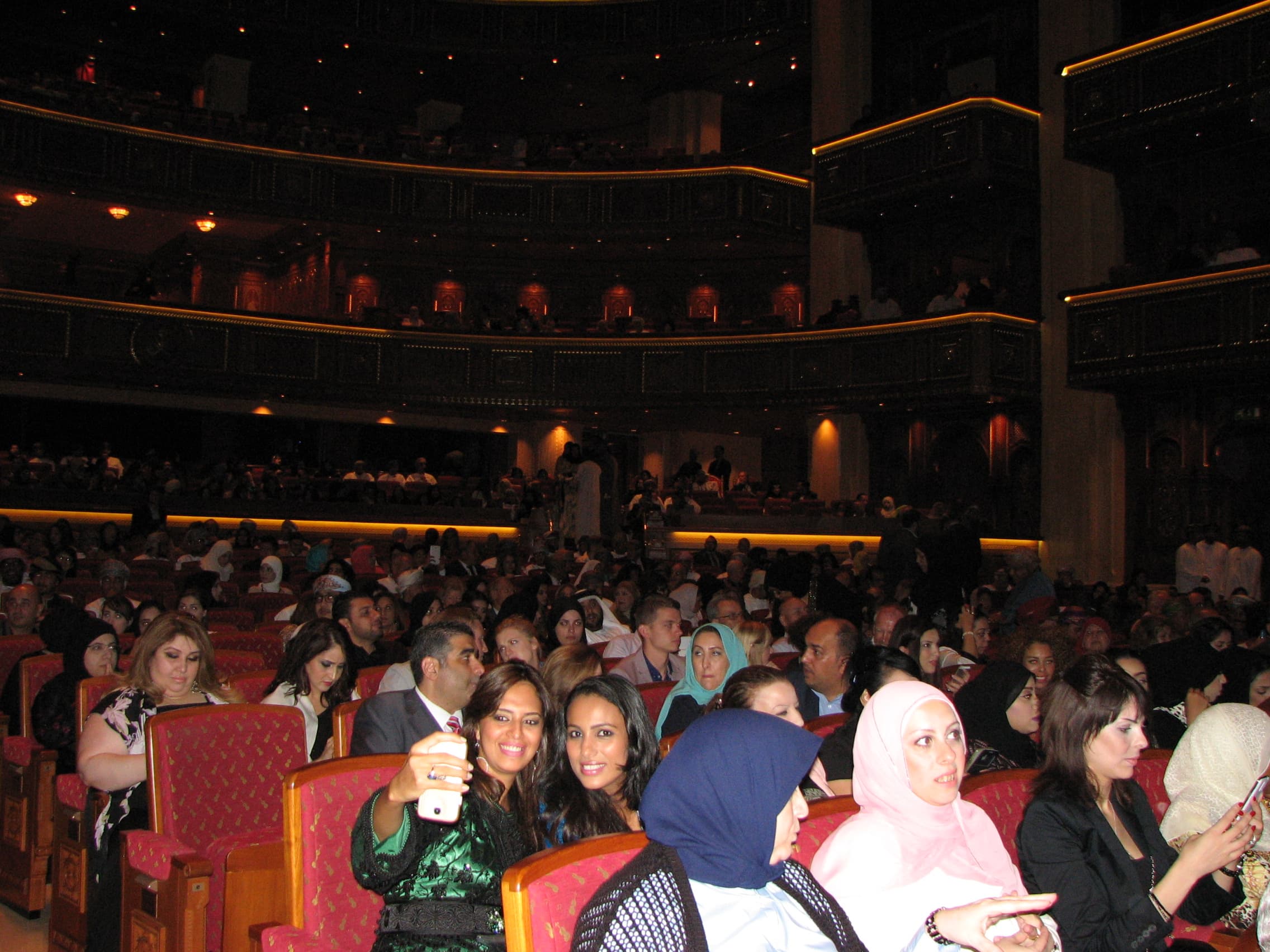 Two women take a selfie at the The Royal Opera House Muscat.