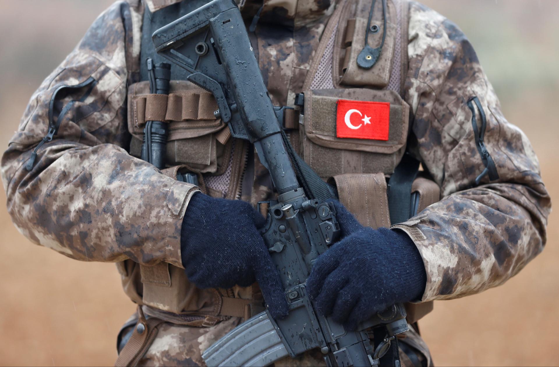 A member of Turkish police special forces stands guard in Azaz, Syria, Jan. 24, 2018.