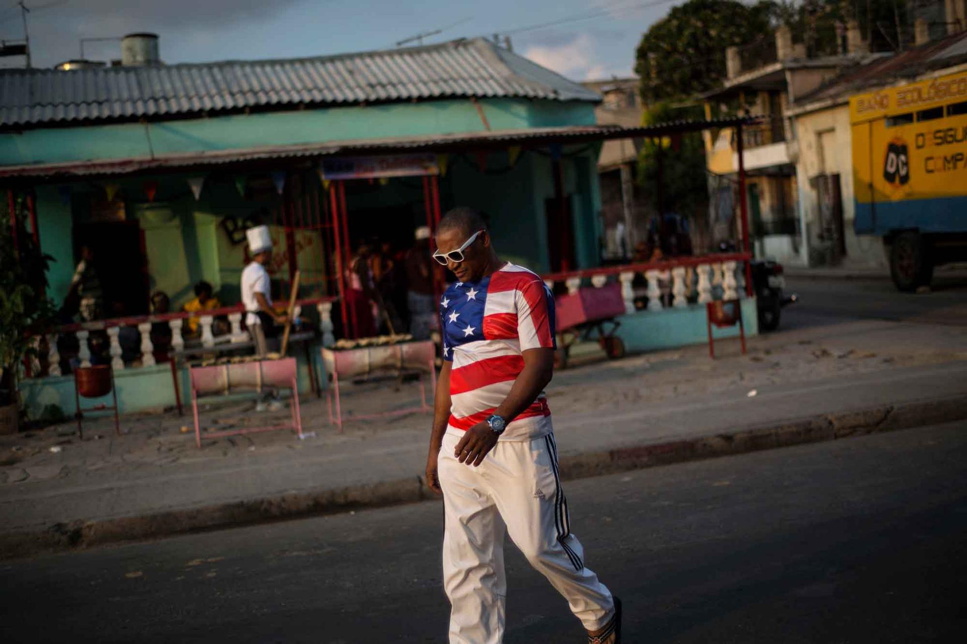A man wears a shirt with a US flag design in Santiago, Cuba, March, 2015.