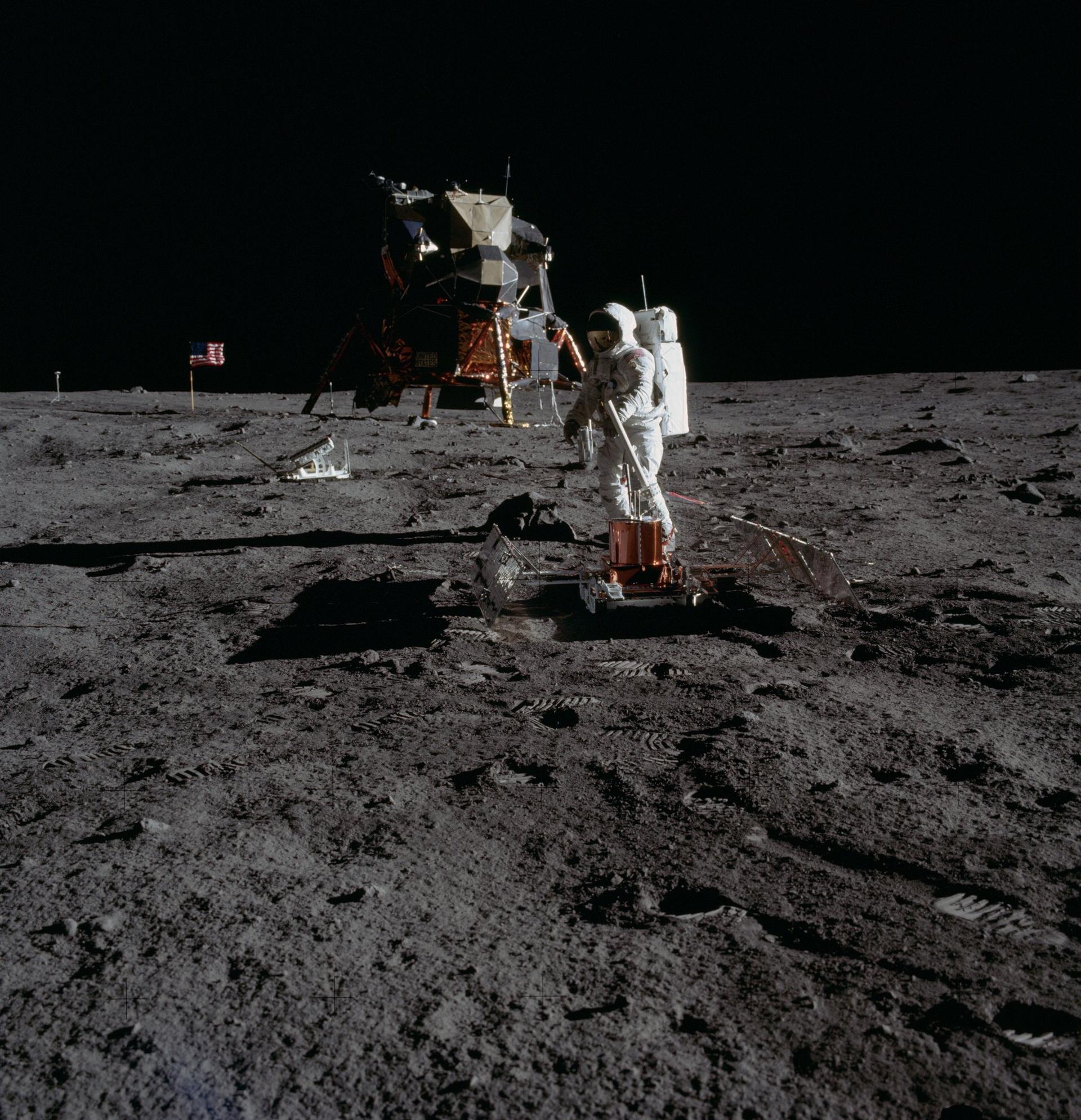 Astronaut Buzz Aldrin levels the Passive Seismic Experiments Package PSEP. Image taken at Tranquility Base during the Apollo 11 Mission. Credit: NASA