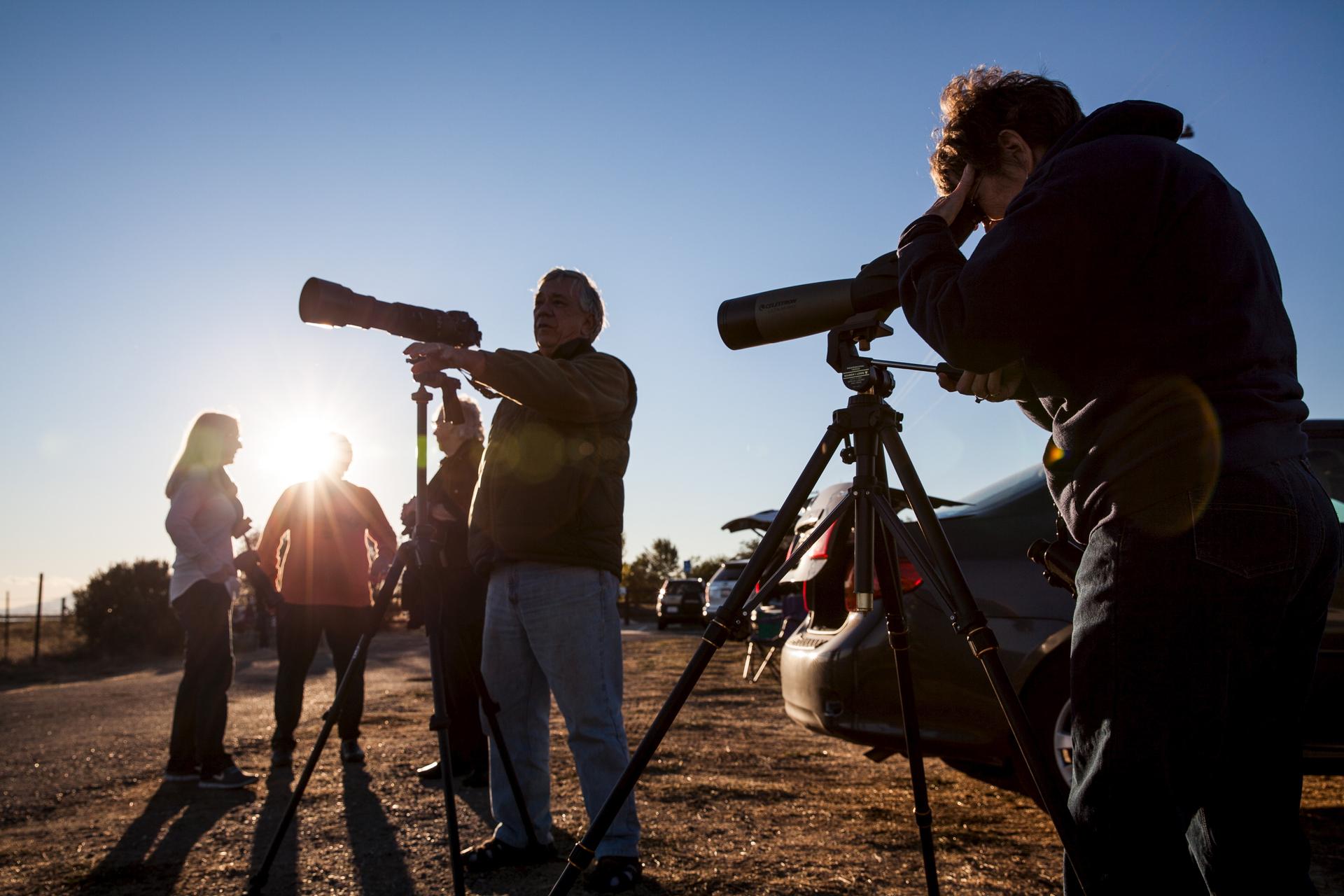 Bird watchers at the Sandhill Crane Reserve near Thornton, California.