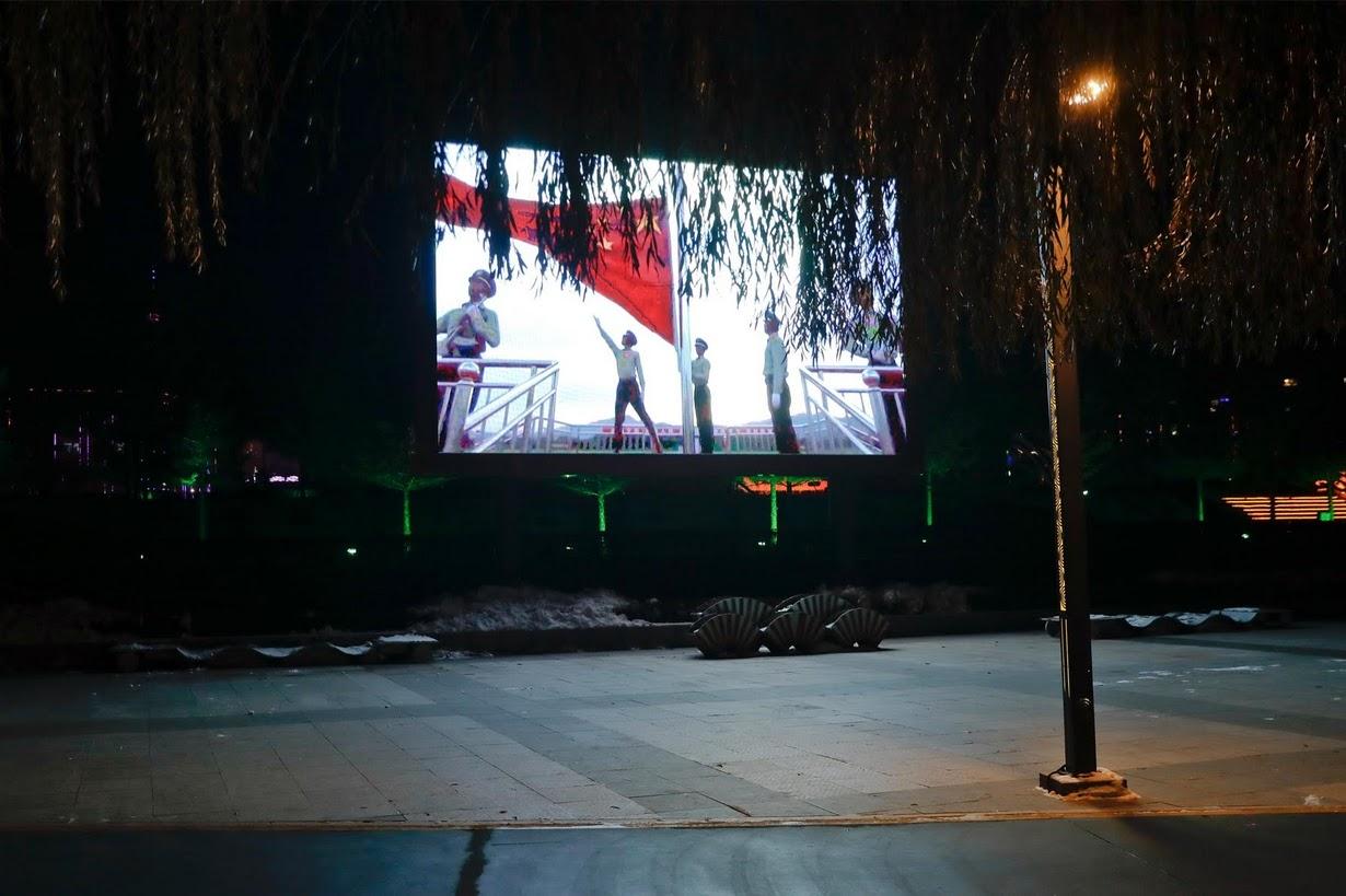 A large screen, which faces North Korea, broadcasts propaganda videos on an island on the Yalu River