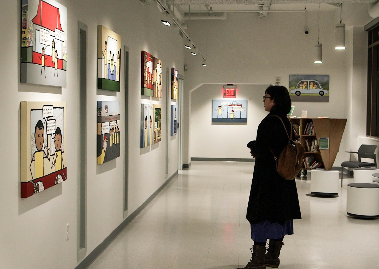 A woman looks at the exhibit, 