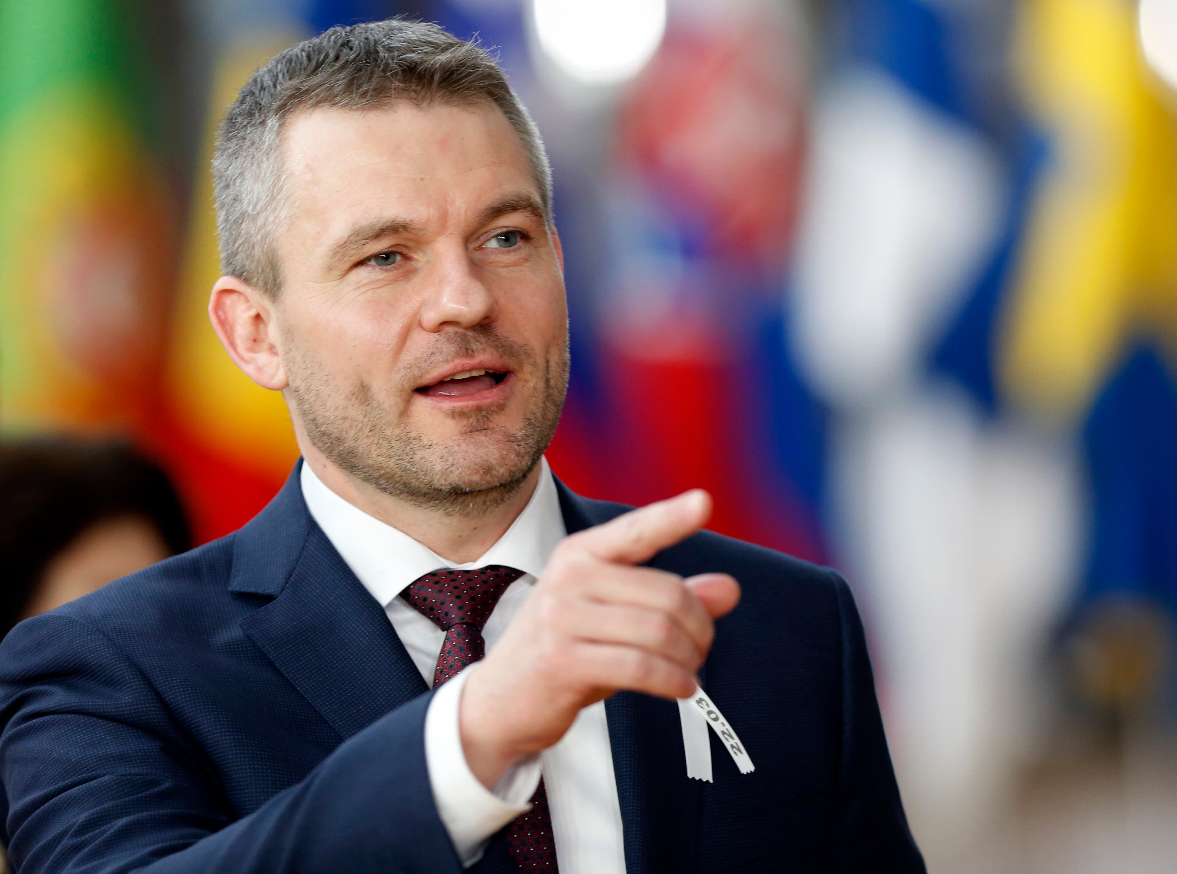 Slovakia’s Prime Minister Peter Pellegrini gestures as he arrives at a European Union leaders summit in Brussels, Belgium, March 22, 2018.