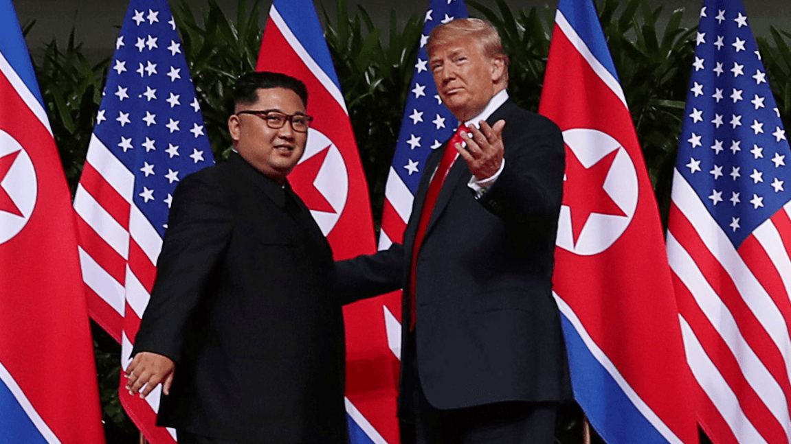 Presiden Donald Trump and leader Kim Jung-un meet at a historic summit.