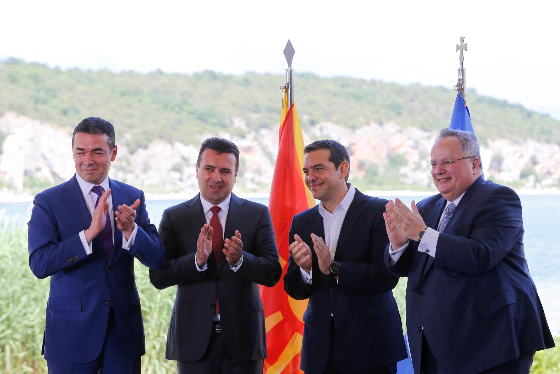 Greek Foreign Minister Nikos Kotzias, his Macedonian counterpart Nikola Dimitrov, Greek Prime Minister Alexis Tsipras and Macedonian Prime Minister Zoran Zaev