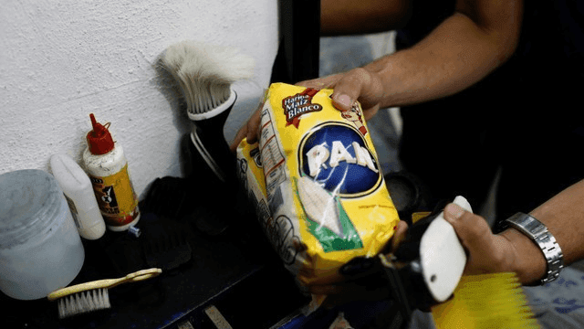 fish, flour and other provisions await trade in Venezuela