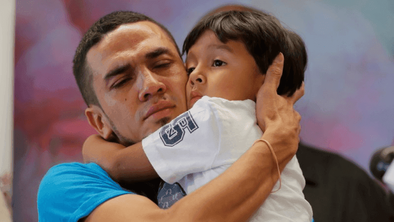 a man and his son are reunited after being separated at the border in the US