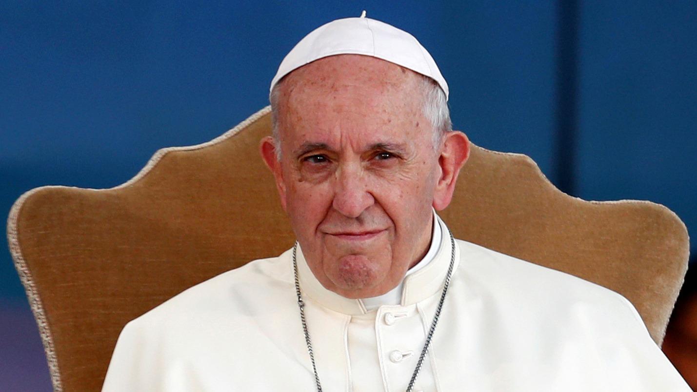 Pope Francis is seen in his papal white in a medium-wide photograph in Rome, August 2018.