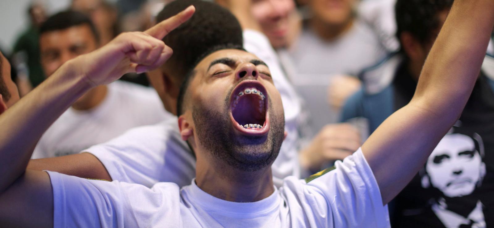 Supporters of right-wing presidential candidate Jair Bolsonaro react in São Paulo, Brazil