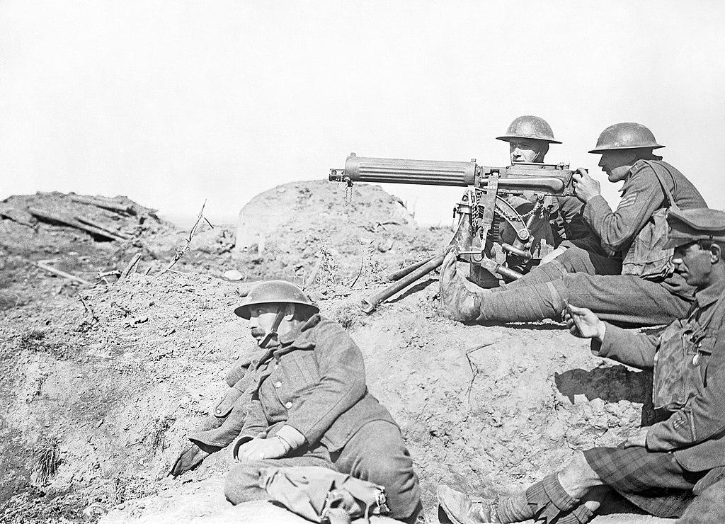 British Vickers machine gun crew hold their guns.
