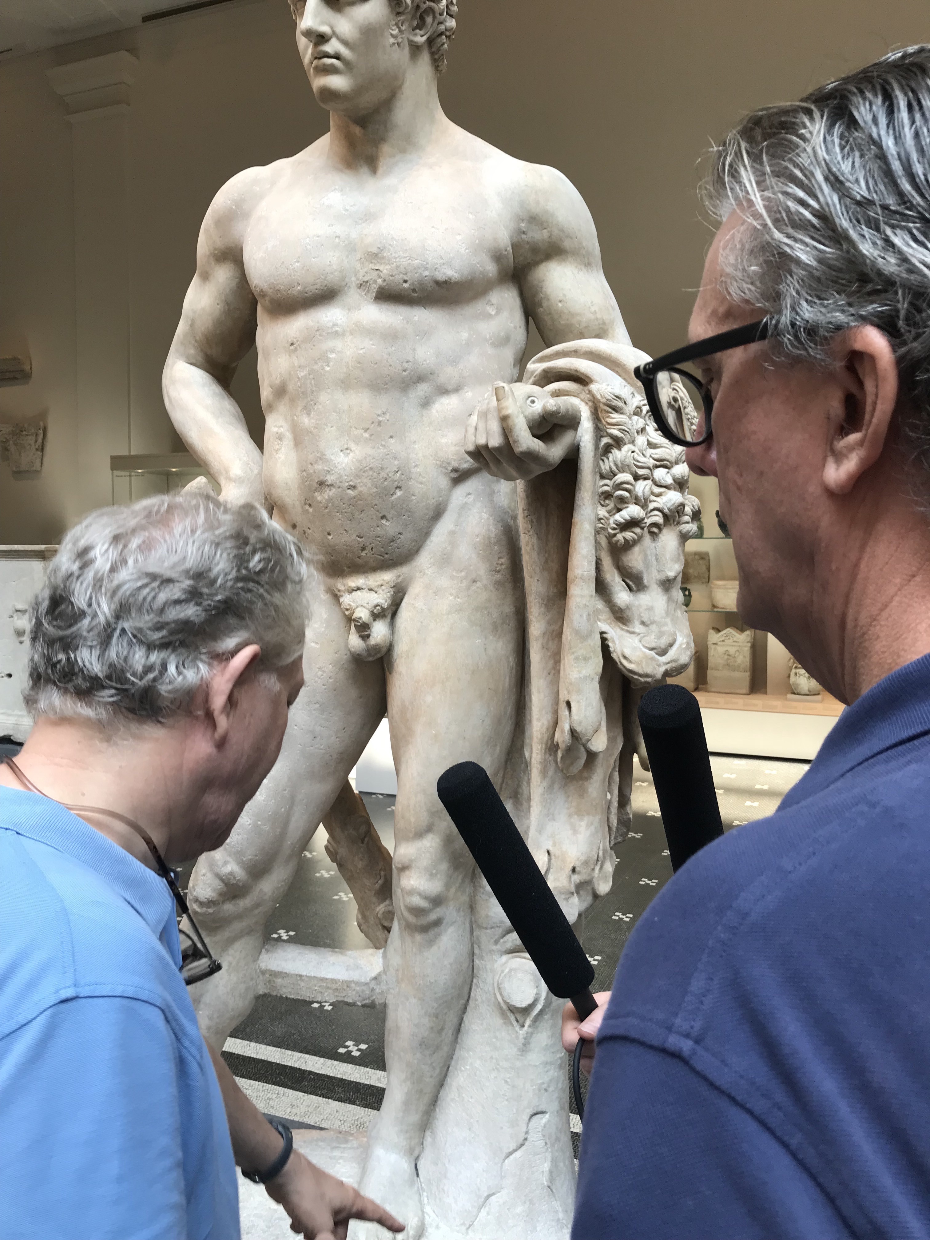 Andrew Lear and Kurt Andersen look at a marble statue of a youthful Hercules from 69-96 A.D.