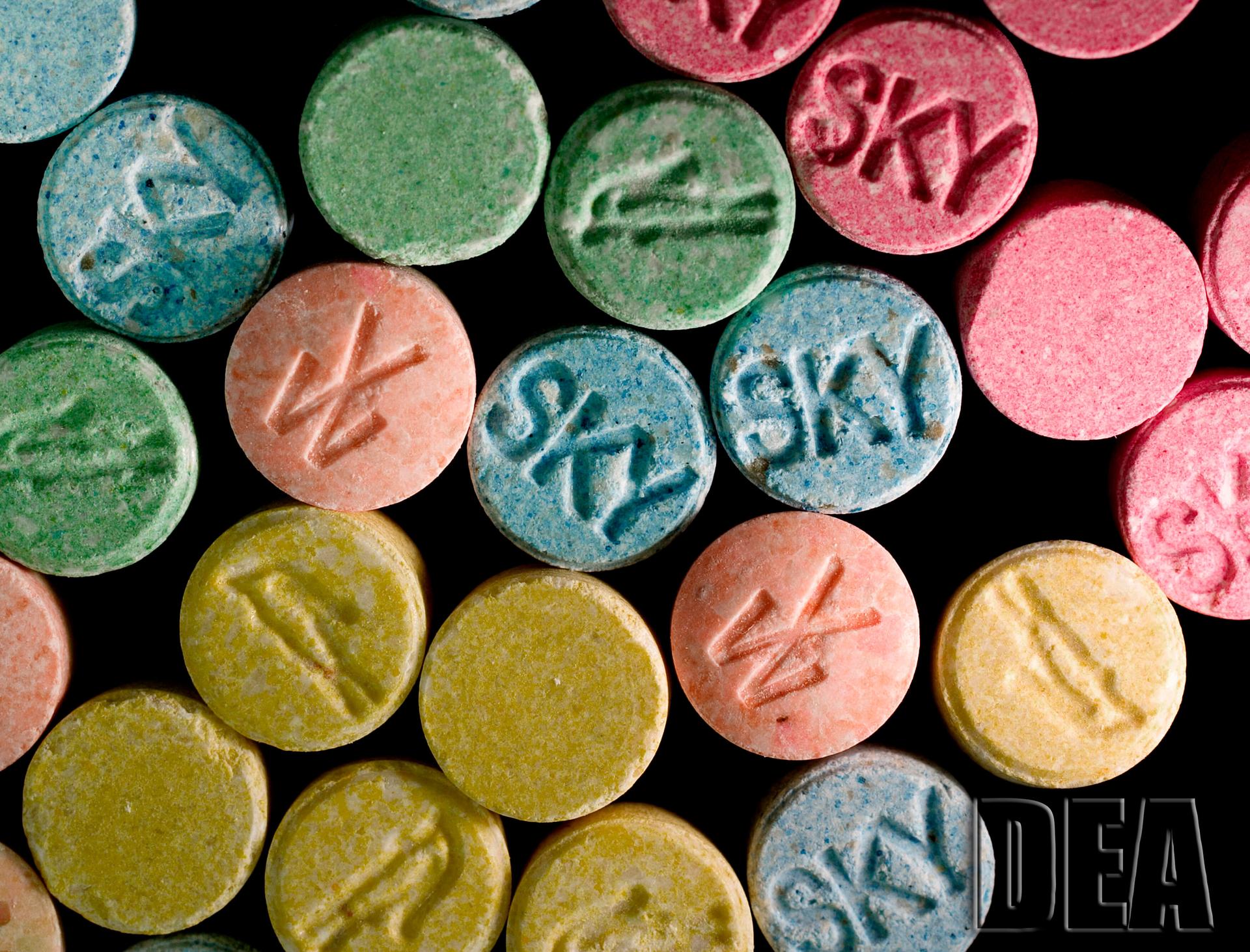 several multi-colored MDMA pills