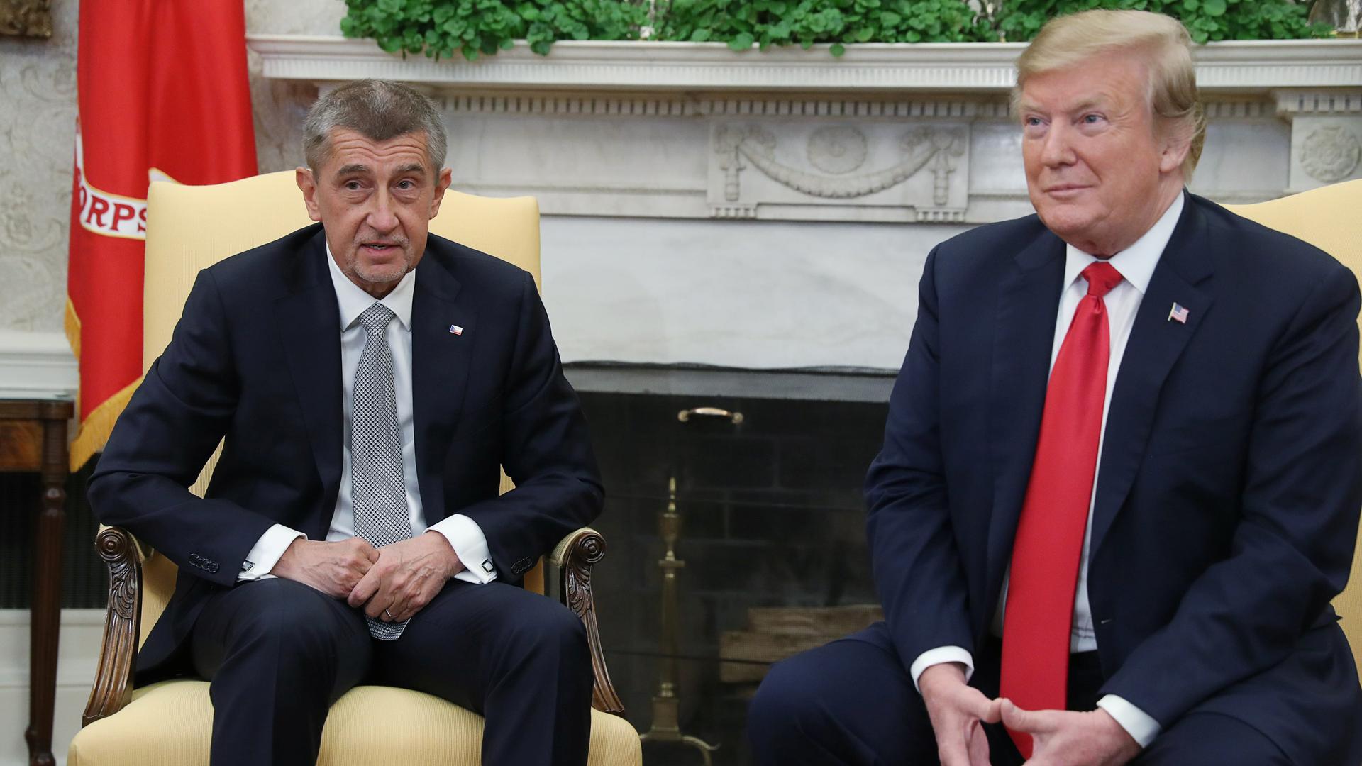 Andrej Babis sits next to Trump.