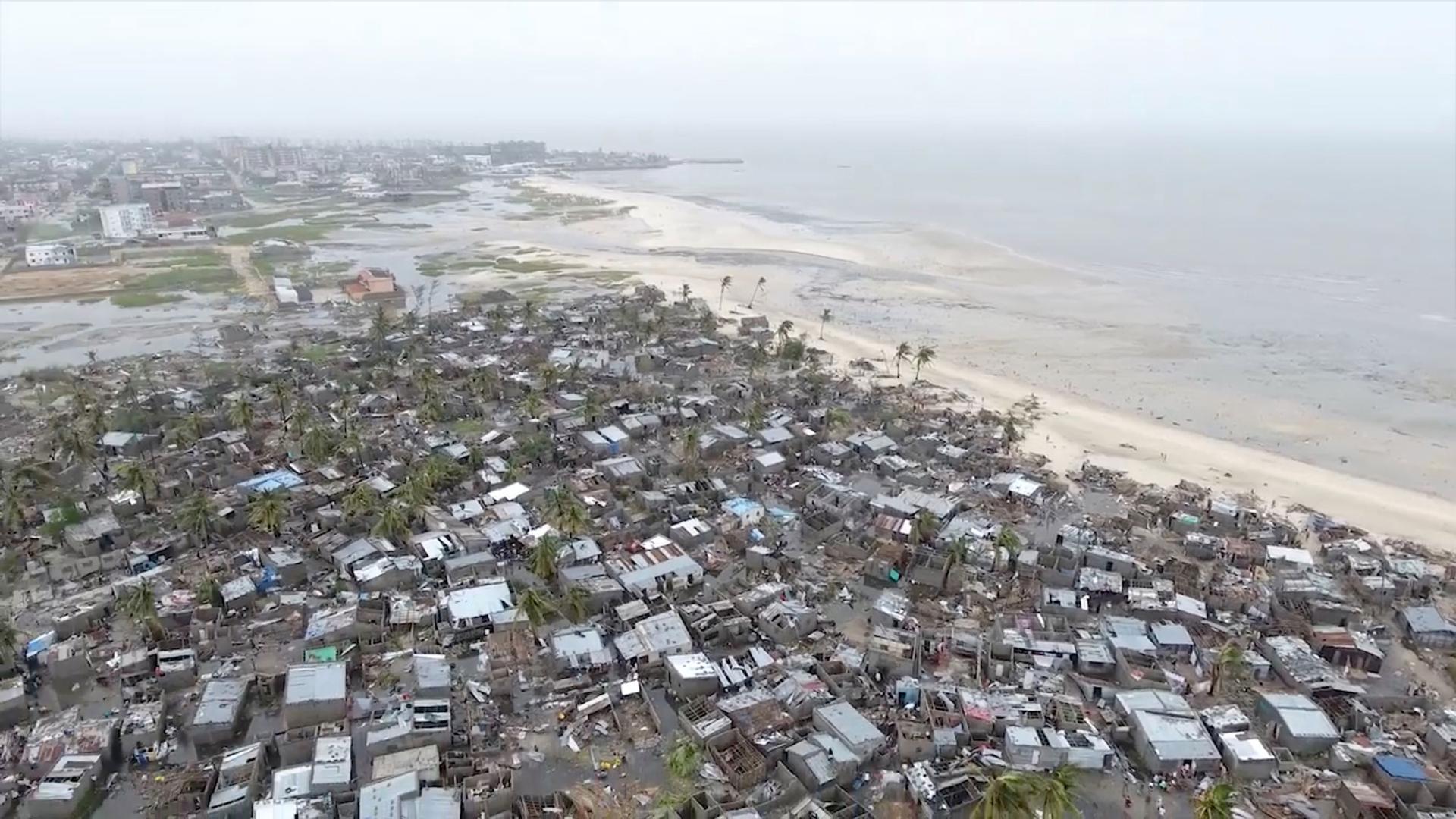 A still photo taken from drone footage above a settlement on the edge of Beira, Mozambique showing dozens of buildings flooded.