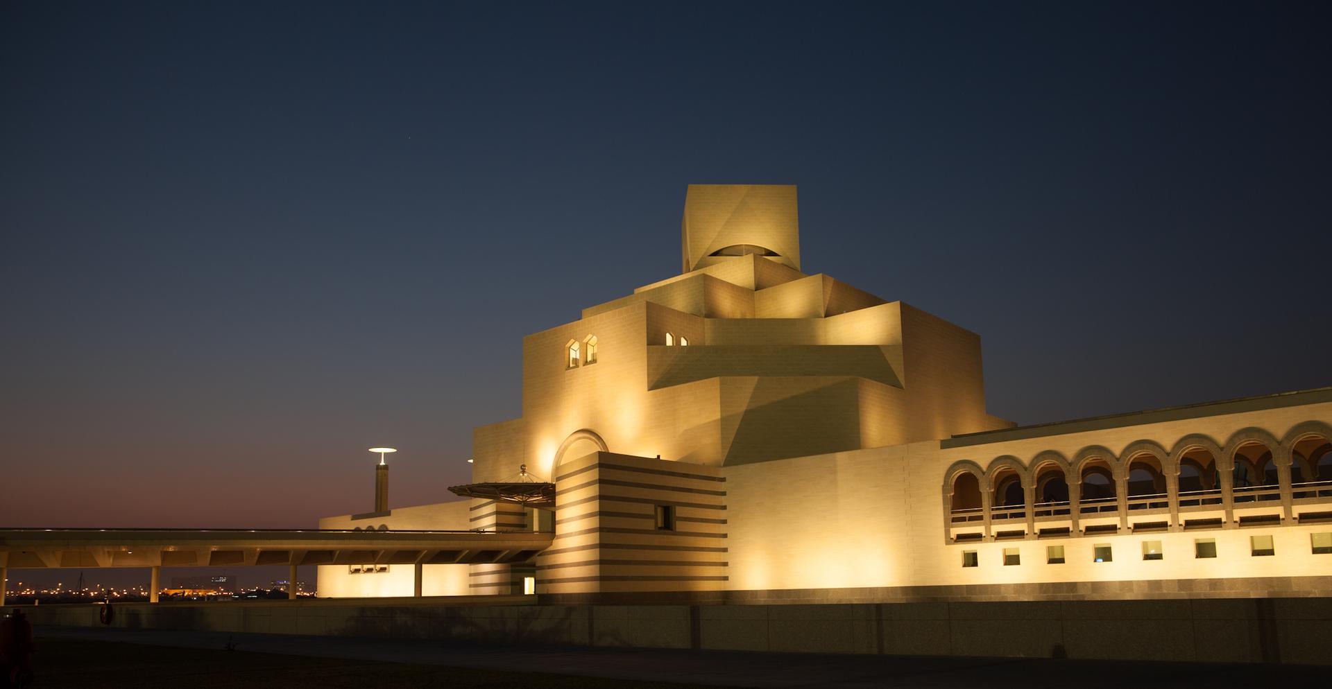 A nighttime view of the Museum of Islamic Art.