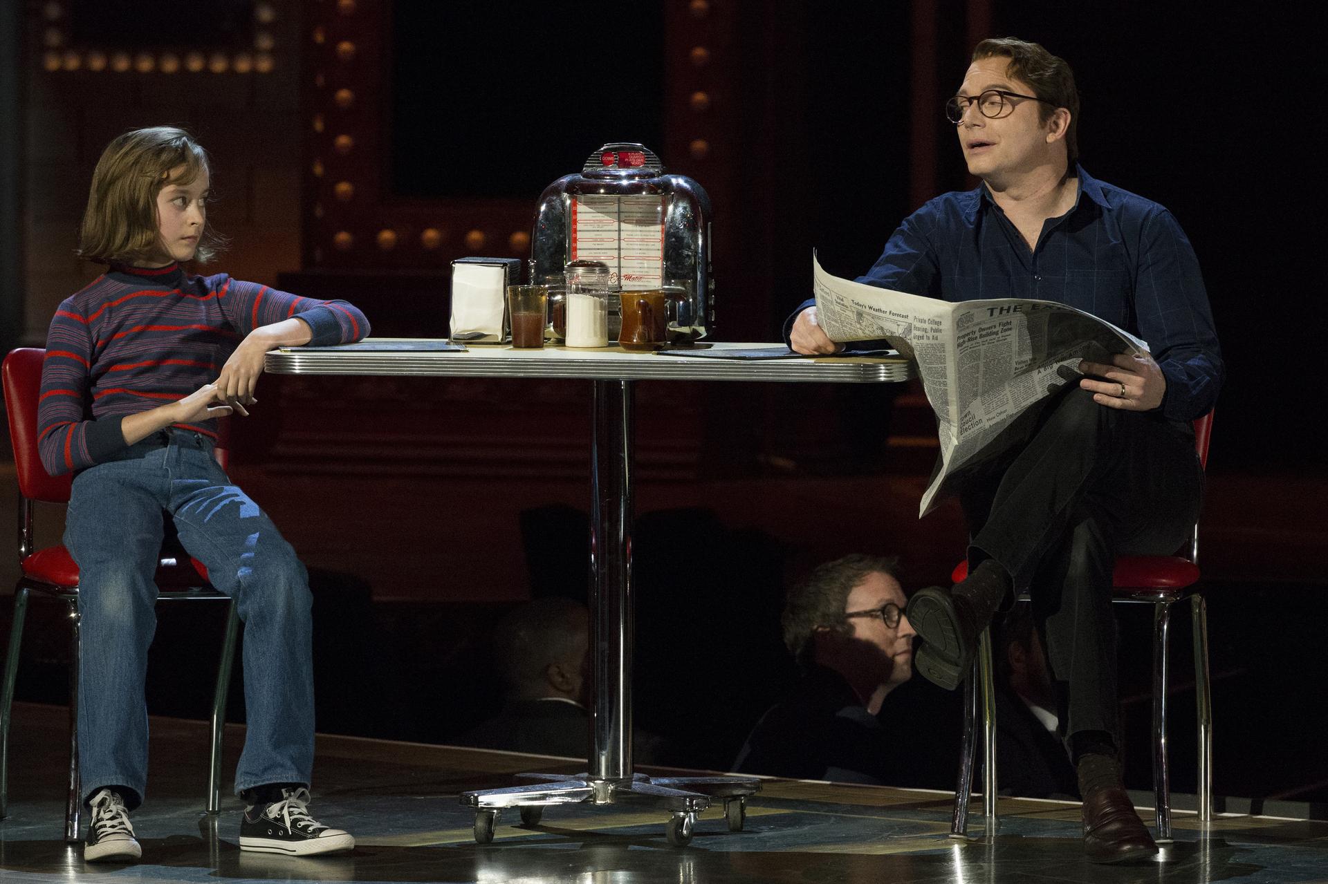 Sydney Lucas (L) performs a scene from "Fun Home" with a cast member during the Tony Awards in New York June 7, 2015.