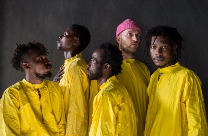 Congolese Collective KOKOKO! in yellow jumpsuits