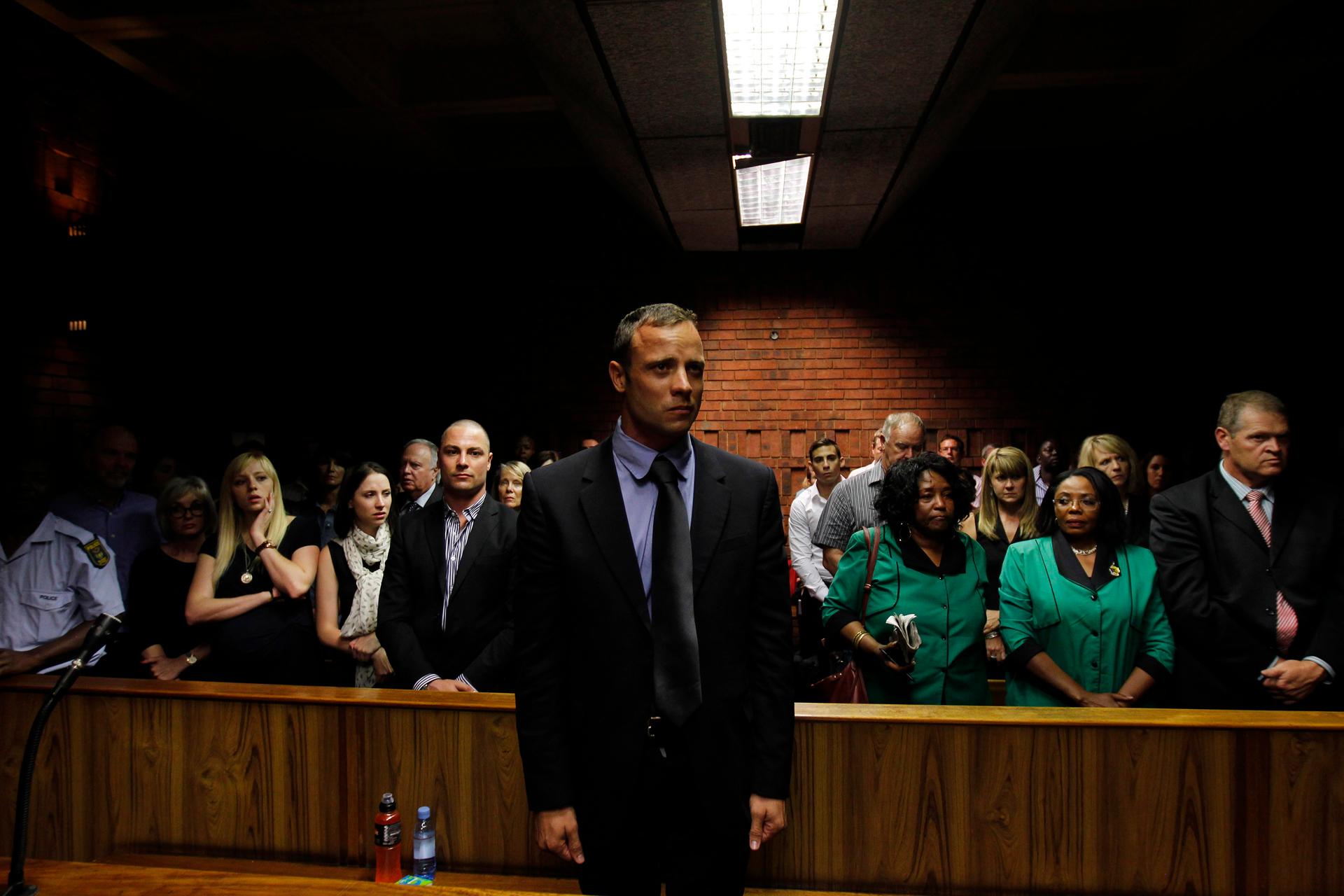 Oscar Pistorius awaits the start of court proceedings