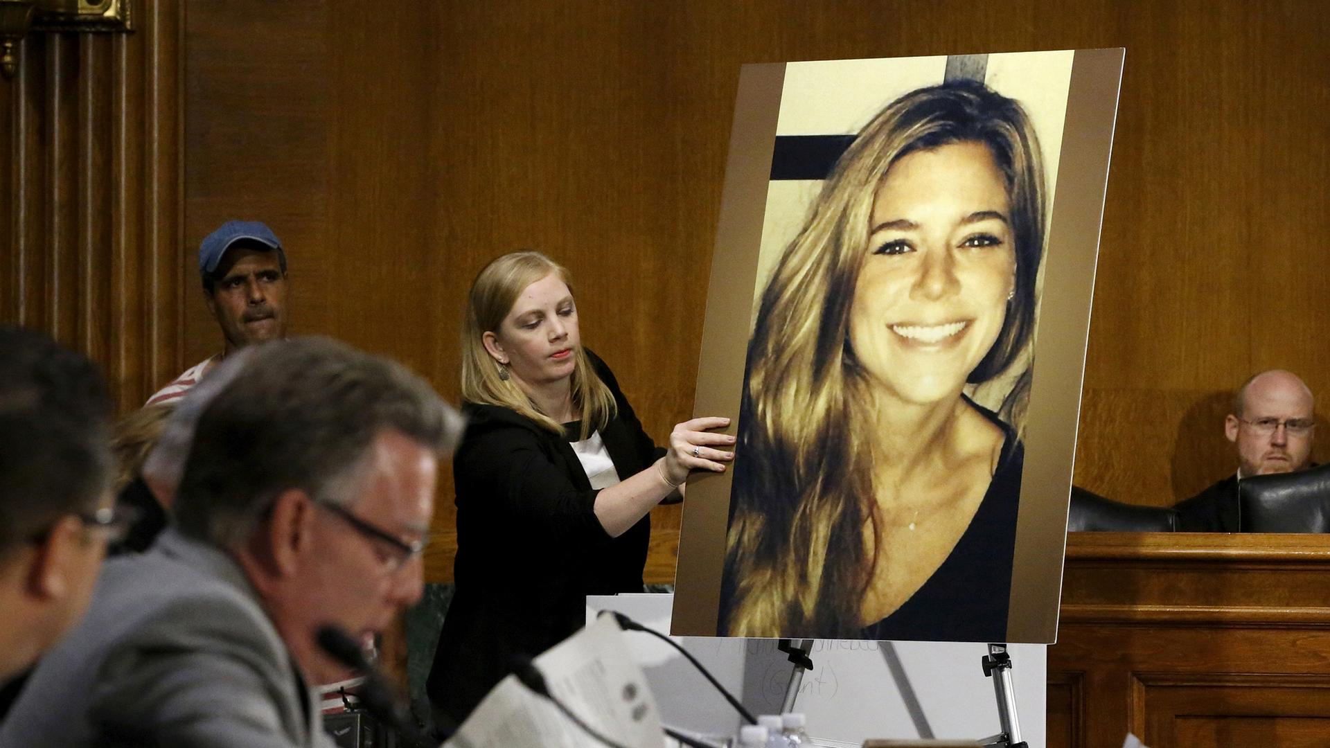 A photo of murder victim Kate Steinle is placed on an easel a hearing of the Senate Judiciary Committee.