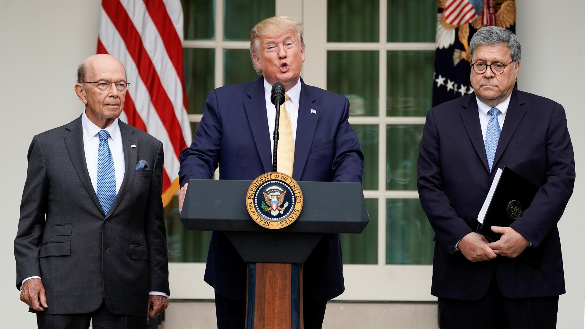 President Trump speaks at a podium