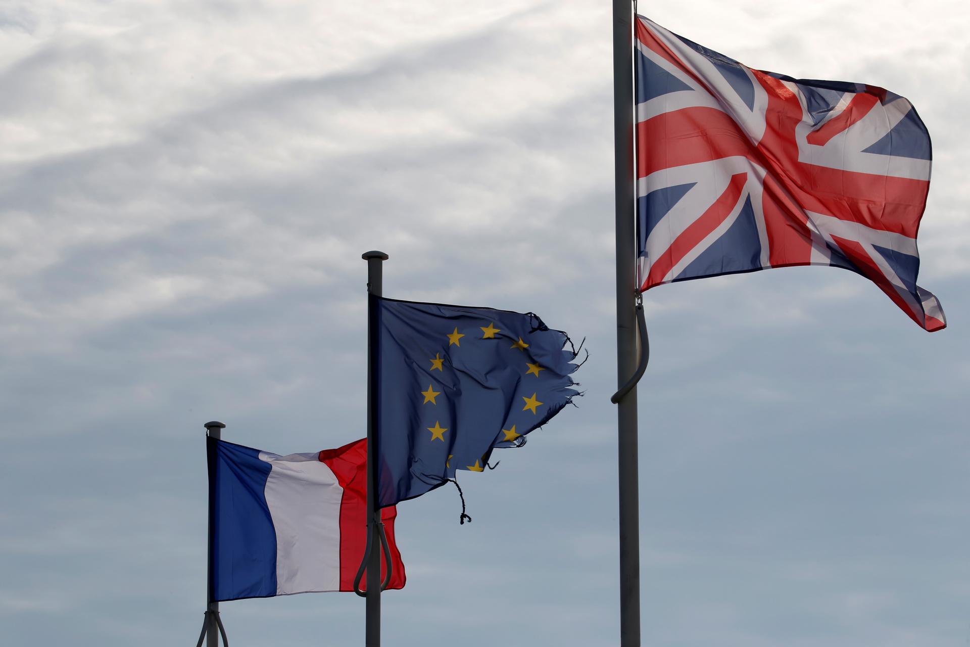 The French, European Union, and British Flags.