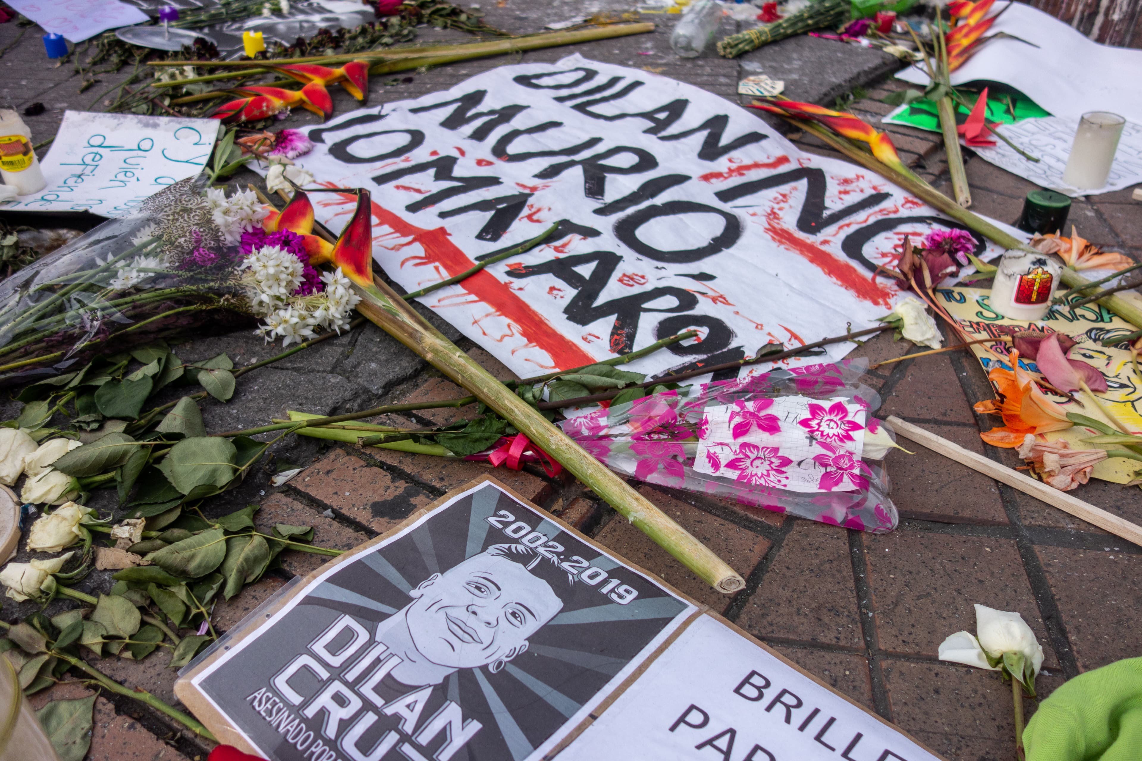 A protest sign announcing death of Dilan Cruz