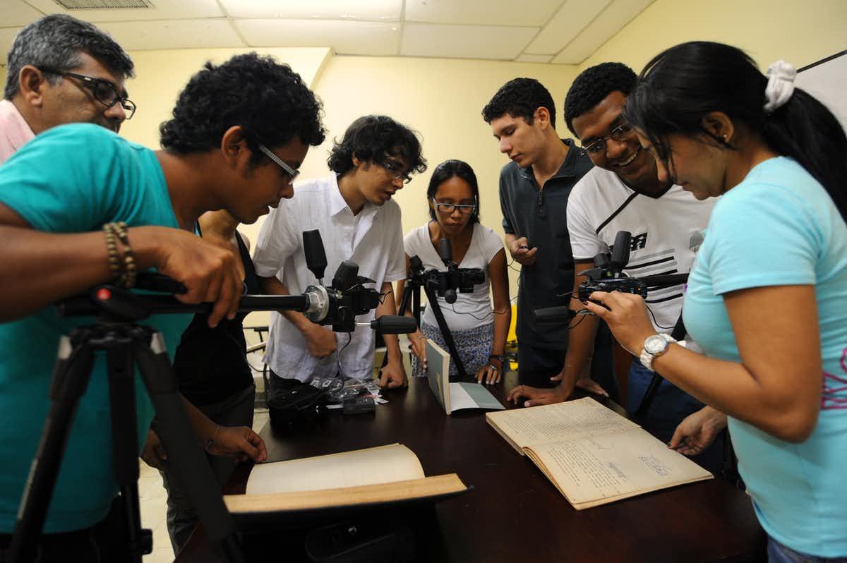 A lot of people get involved, both teaching and learning how to properly photograph documents. 