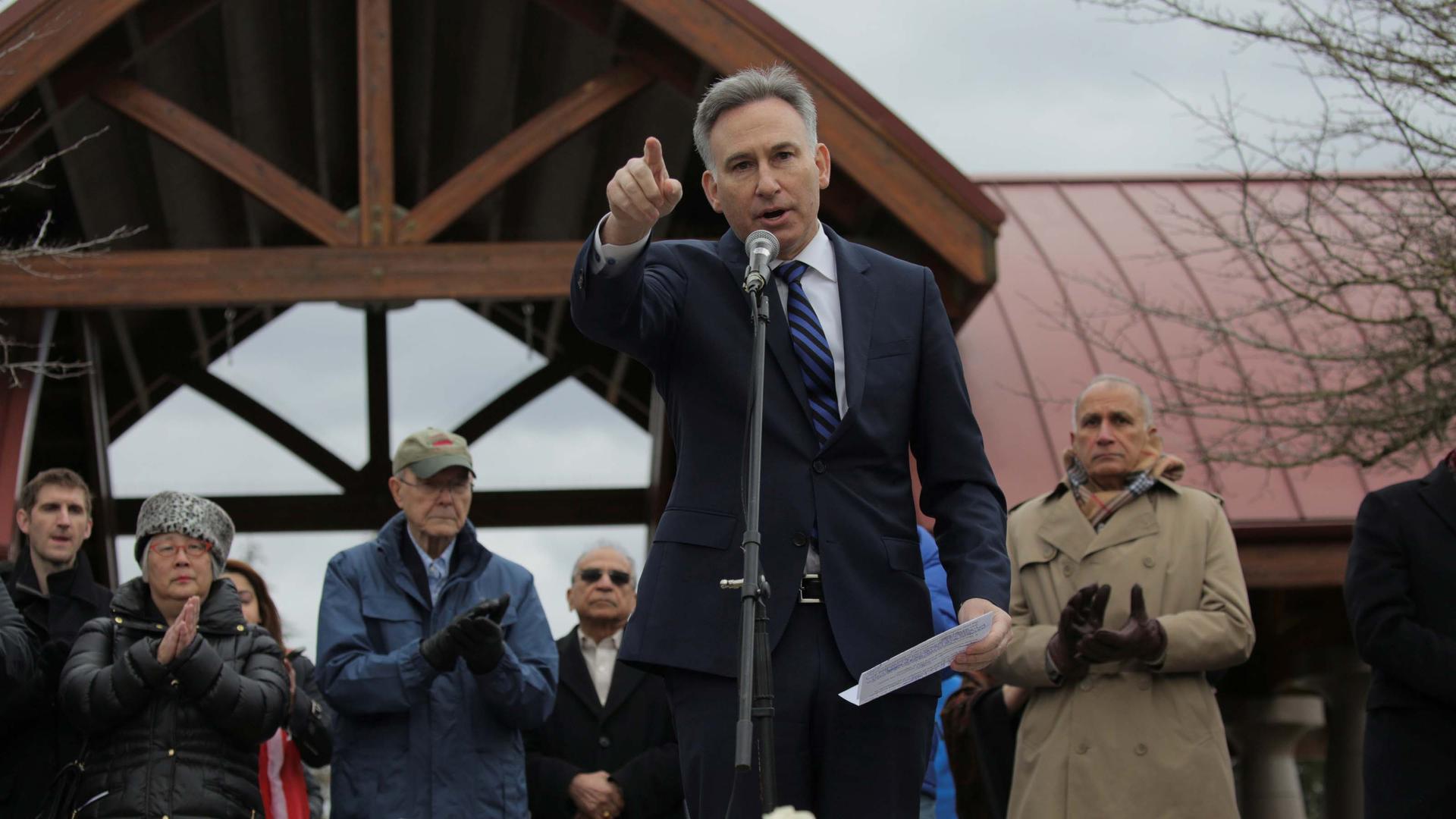 King County Executive Dow Constantine speaks during a vigil in honor of an immigrant from India who was shot and killed in Kansas, in Bellevue, Washington, on March 5, 2017.