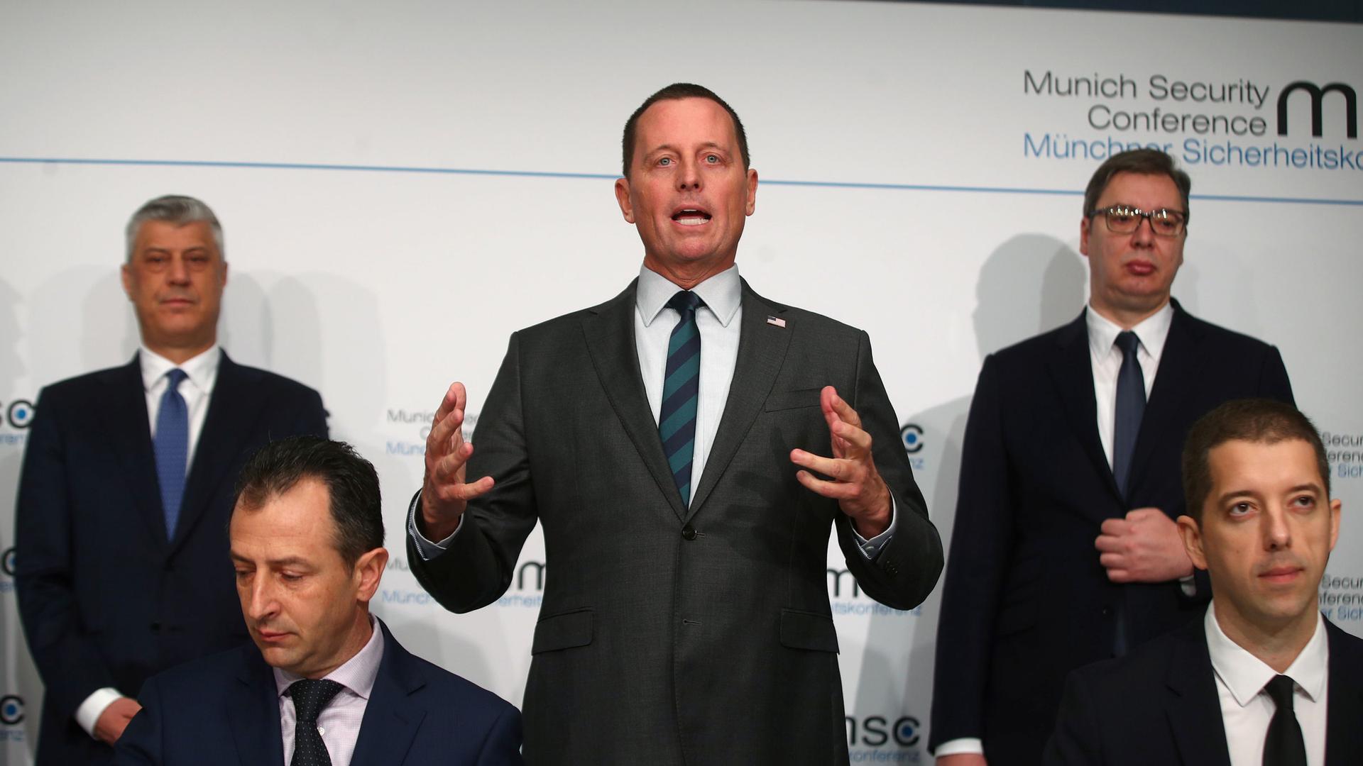 US ambassador to Germany Richard Grenell, Kosovo's President Hashim Thaci and Serbia's President Aleksandar Vucic attend the Munich Security Conference in Munich, Germany, Feb.14, 2020.