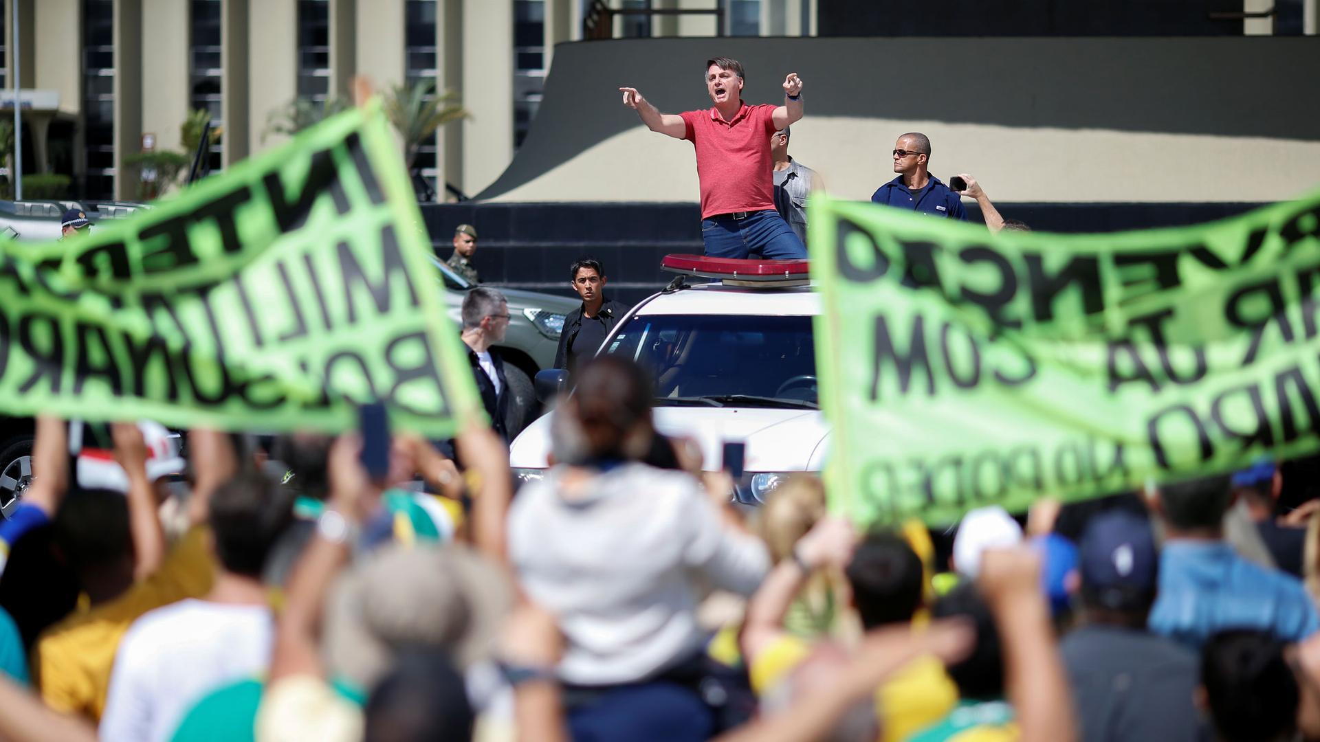 A man speaks to a crowd