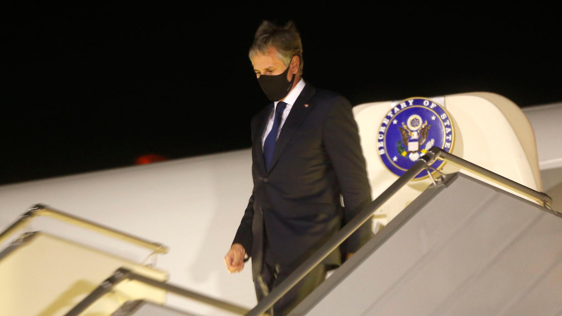 US Secretary of State Antony Blinken disembarks after landing at Boryspil International airport outside Kyiv, Ukraine, early Thursday, May 6, 2021. 