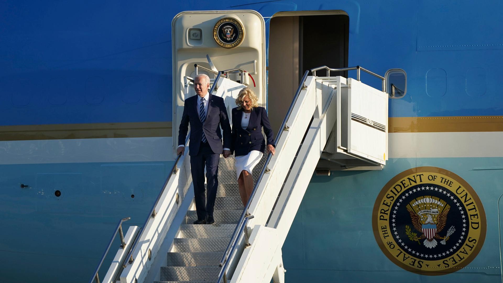 US President Joe Biden and First Lady Jill Biden arrive aboard Air Force One at RAF Mildenhall, England, ahead of the G-7 summit in Cornwall, Wednesday June 9, 2021. 