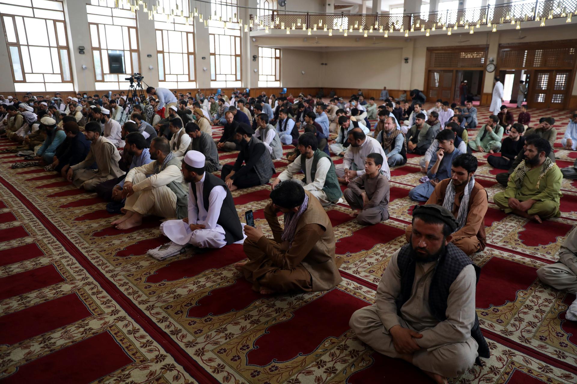 Muslims offer Eid al-Adha prayers in Kabul, Afghanistan, July 20, 2021. Eid al-Adha, or "Feast of the Sacrifice," commemorates the Quranic tale of Prophet Ibrahim's willingness to sacrifice his son as an act of obedience to God.